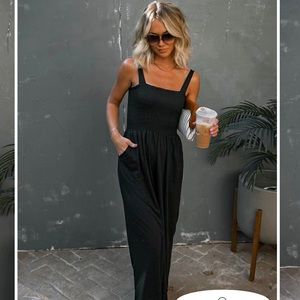 VICI smocked jumpsuit. Like new. Never washed or worn, just fits to big on me.